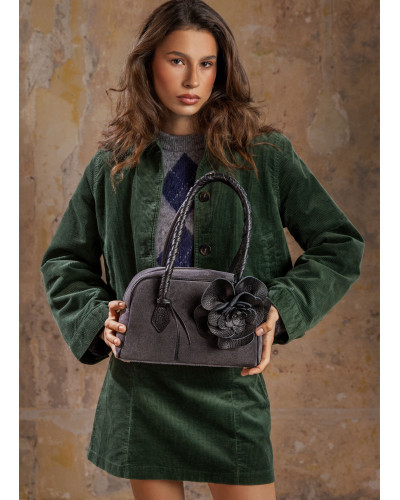 Women's handbag with a detachable flower