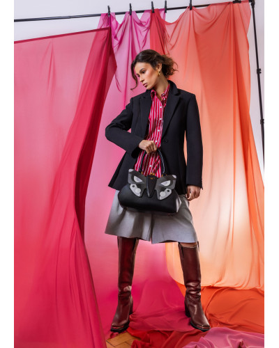 Double-sided bag with a detachable butterfly