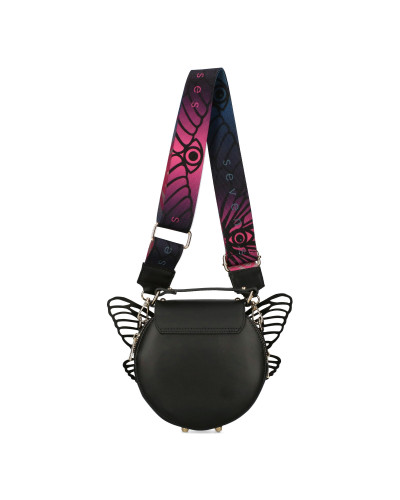 Okrągła torebka z odpinanymi skrzydłami zapakowana w pudełko