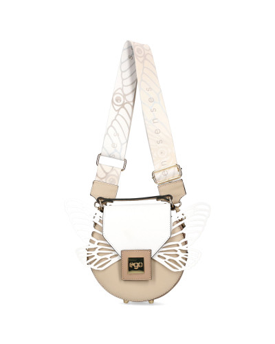 Okrągła torebka z odpinanymi skrzydłami zapakowana w pudełko