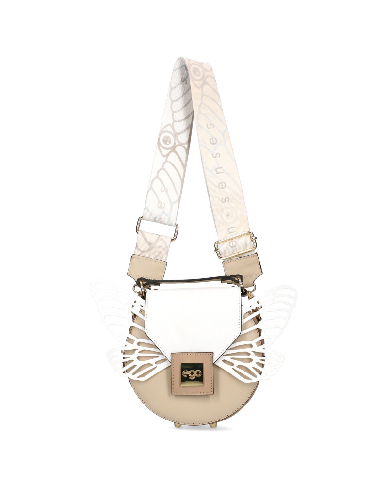 Okrągła torebka z odpinanymi skrzydłami zapakowana w pudełko