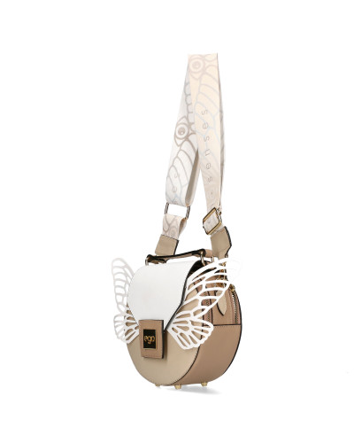 Okrągła torebka z odpinanymi skrzydłami zapakowana w pudełko